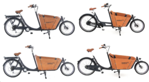 Various Babboe branded Bikes with transportation basket at the front