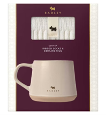 A gift set which contains a ceramic mug and cosy socks